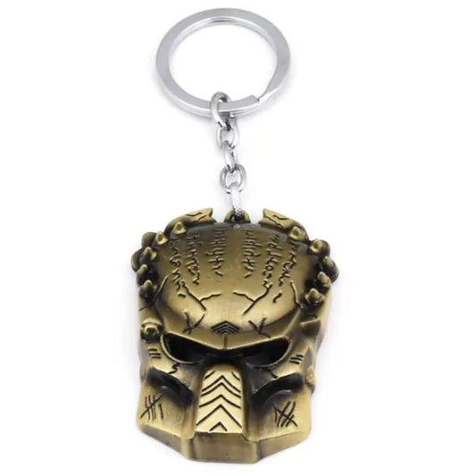 Bronze Predator helmet keychain on a white background